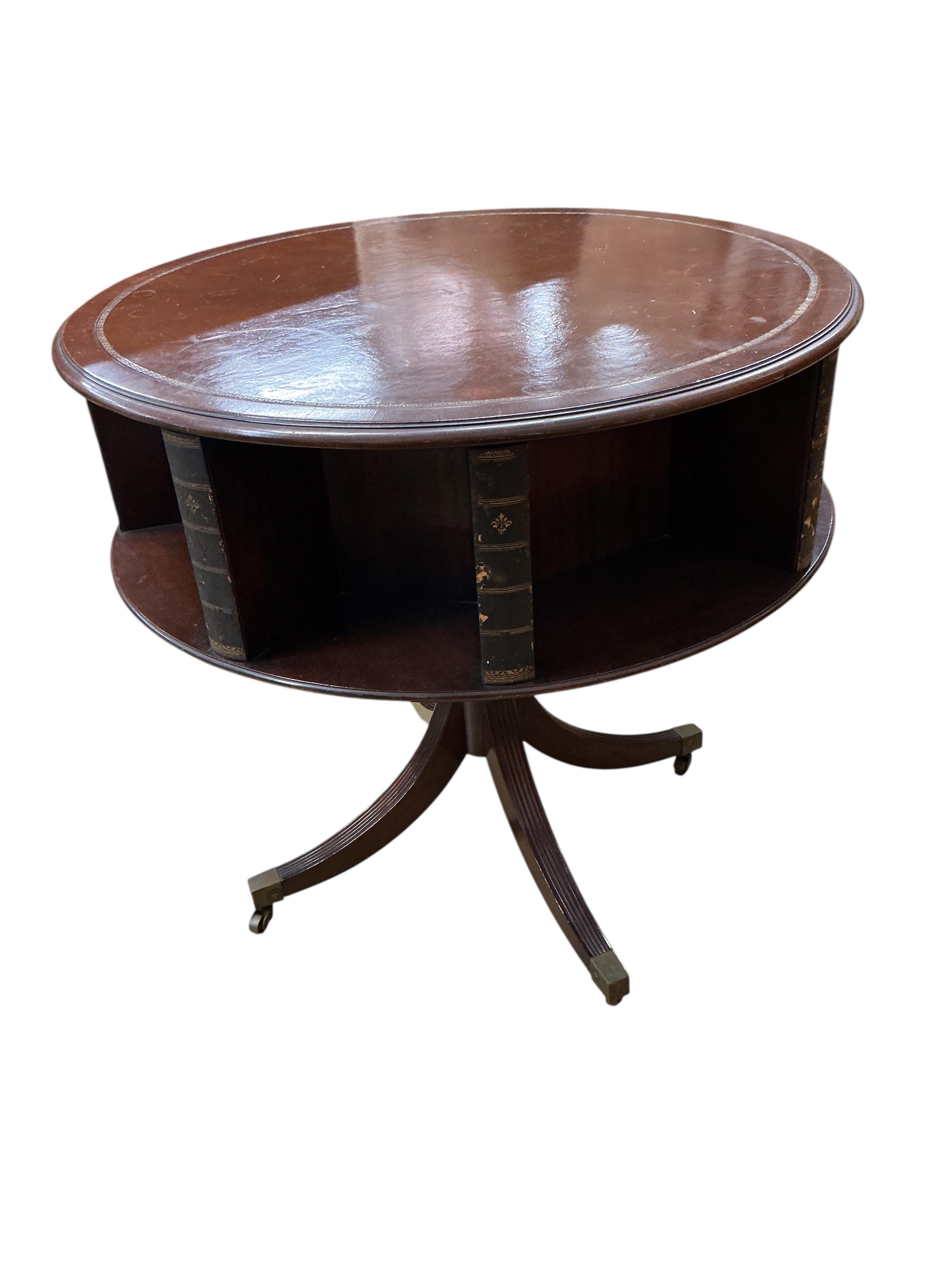 A George III style circular mahogany reading table, diameter 80cm, height 77cm